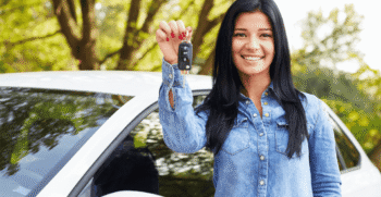 Monthly car rentals in Austin offer a flexible and affordable alternative to car ownership, featuring a customer holding rental car keys.
