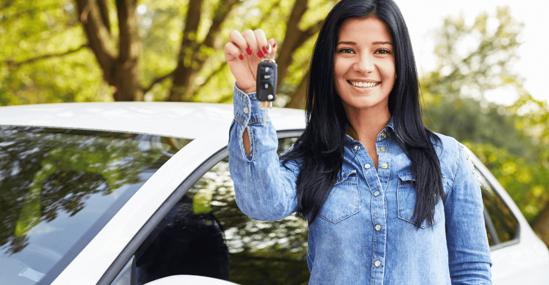 Monthly car rentals in Austin offer a flexible and affordable alternative to car ownership, featuring a customer holding rental car keys.