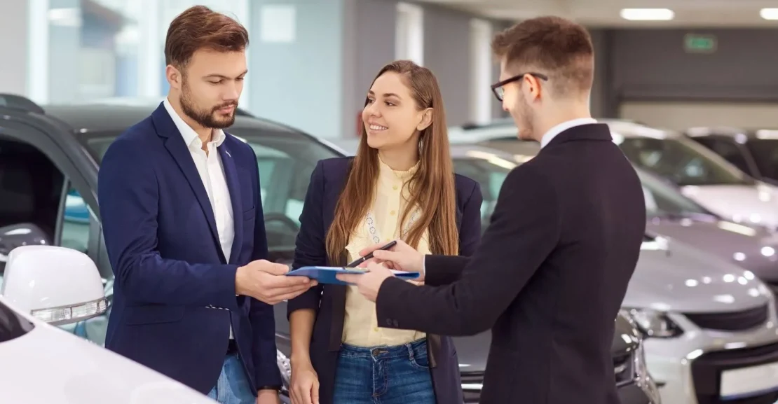 Business travelers arranging a car rental before a business trip for convenient and flexible transportation.